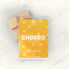 3oz Wax melt churro fragrance with wood background and cream wax